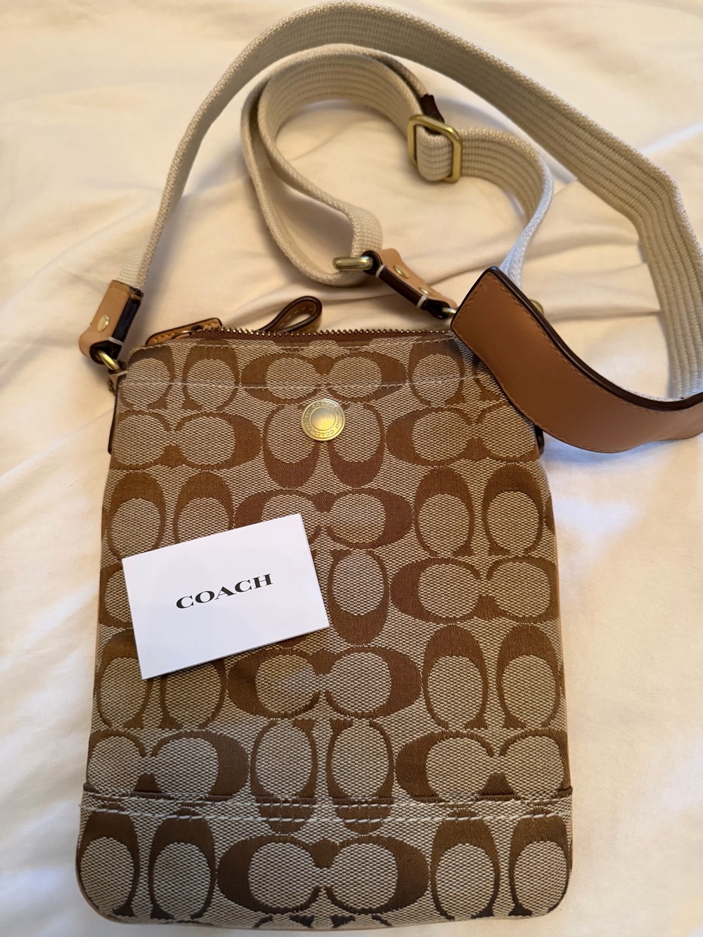 Coach crossbody bag, small, brown and tan